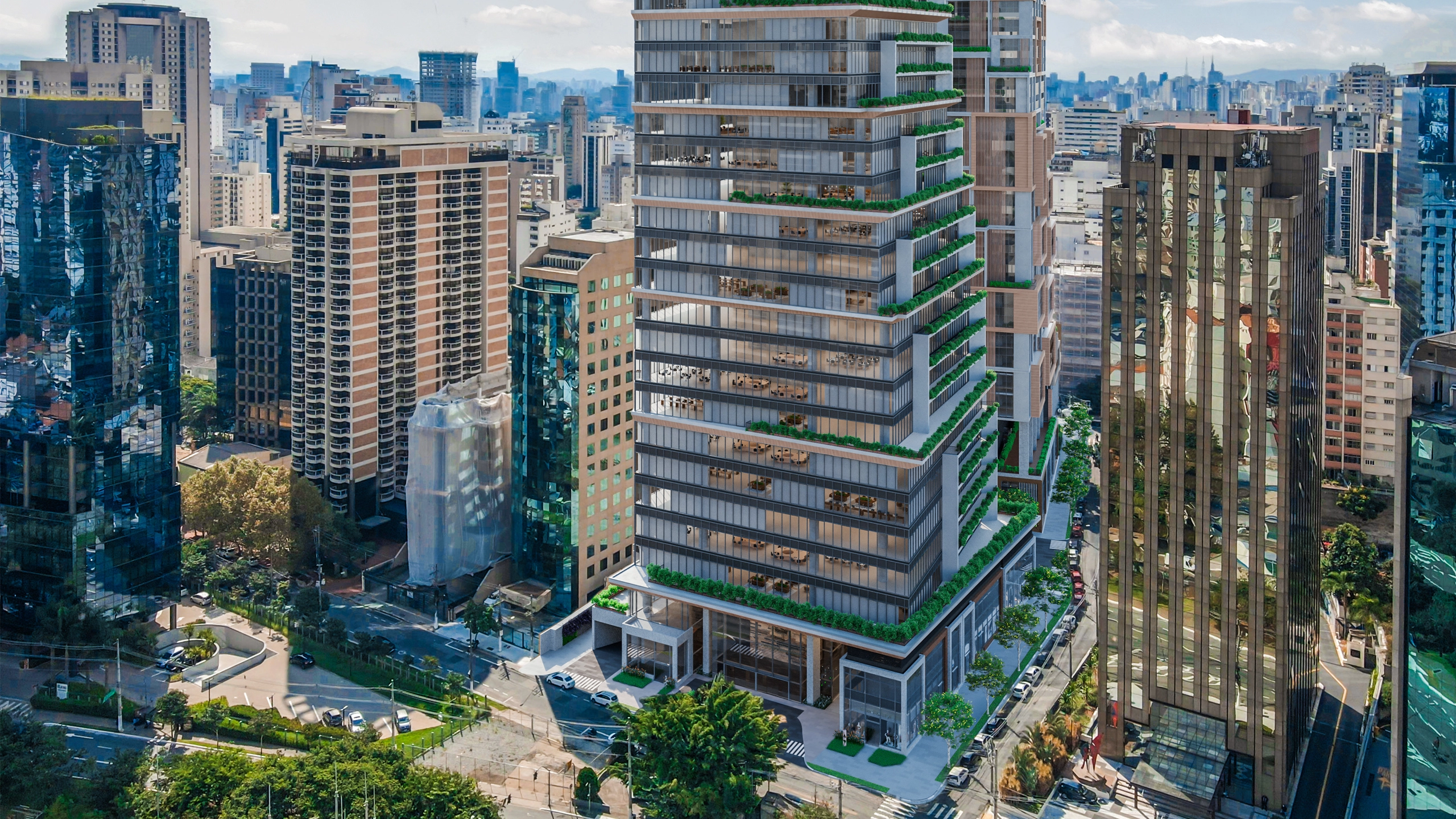 A modern high-rise building in a green city centre