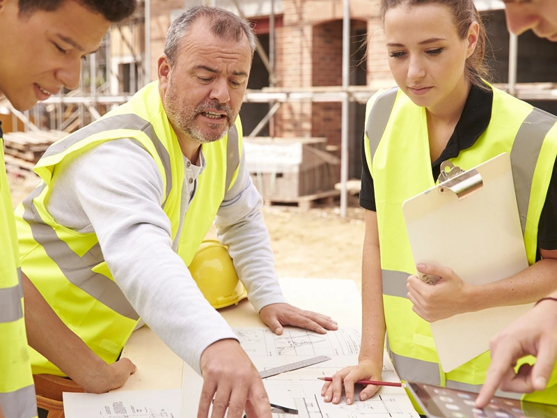Project team in high-vis jackets