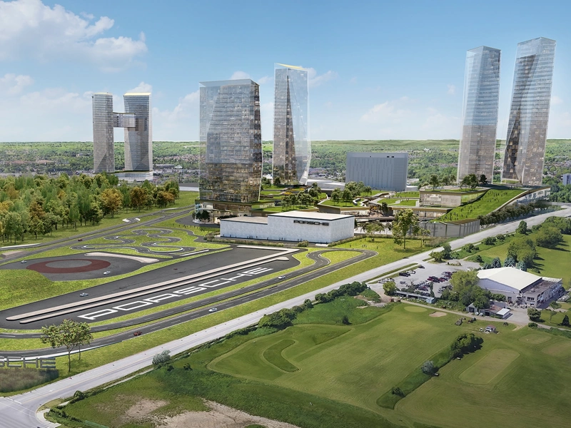 Aerial rendering of the Porsche Experience Centre, featuring race track and futuristic buildings, Toronto, Canada