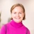Portrait of Sarah Leaman, Global Corporate Communications Director, in an office with a plant in the background