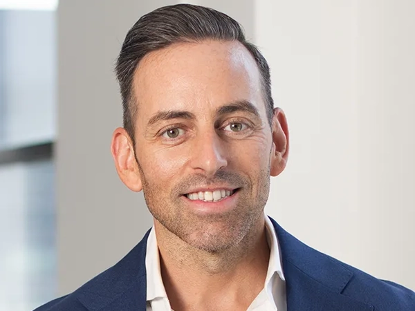 Michael Anello, Vice President, US, in a white office