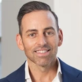 Michael Anello, Vice President, US, in a white office