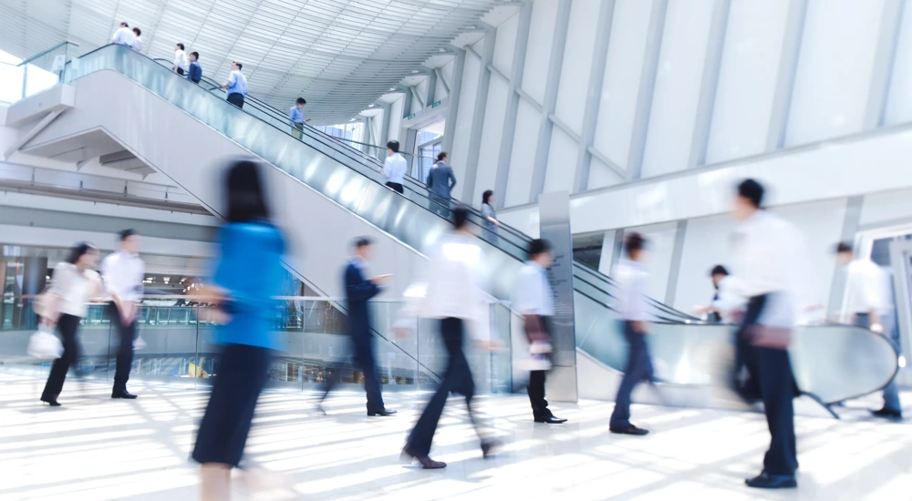 Blurred businesspeople in motion in Hong Kong