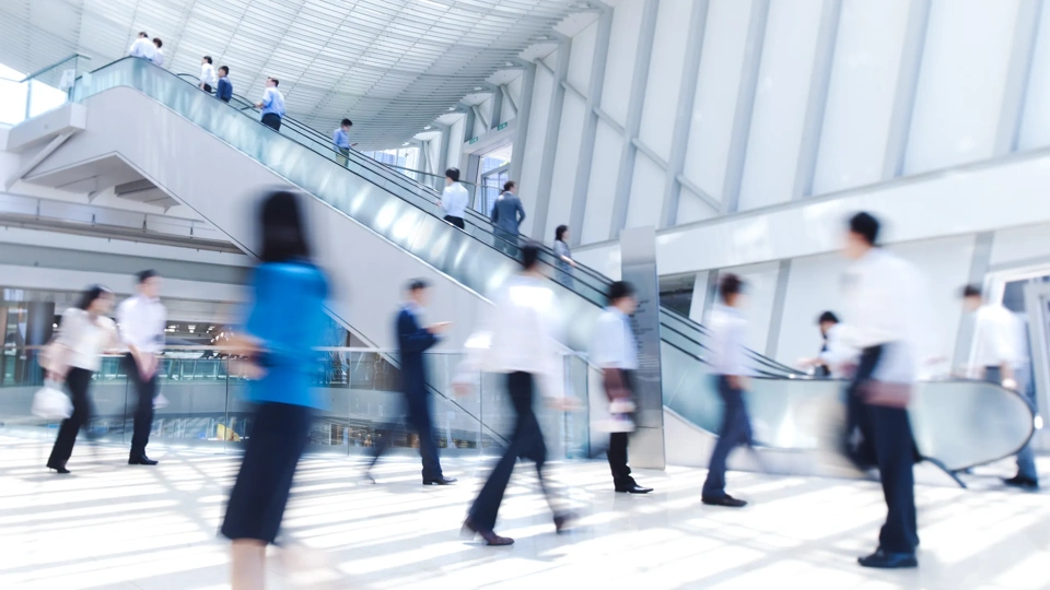 Blurred businesspeople in motion in Hong Kong