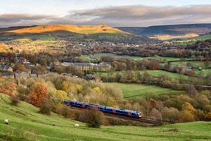 Train passing through English countryside