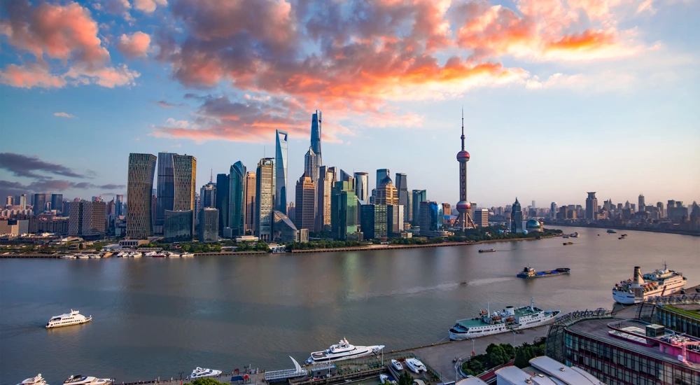 Sunset in Pudong, Shanghai captured on the rooftop of a high-rise building in Puxi