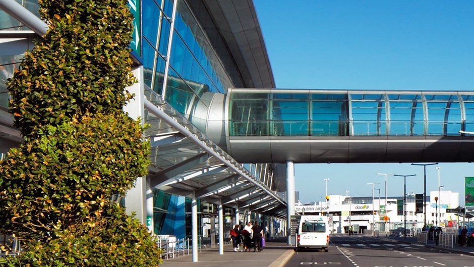 Glass airport terminal with bridge