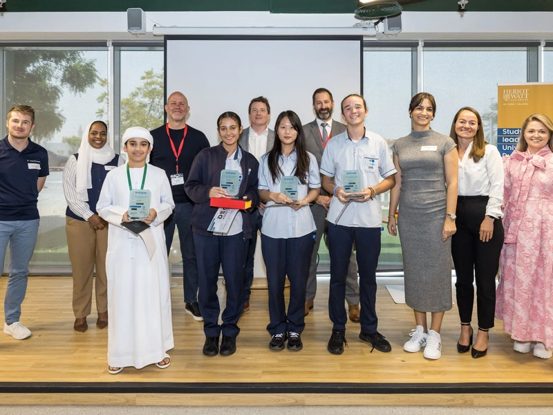Judging panel and staff with winning DEC Wex Team; Omran Al Shamsi, Mariam Morra, Ningge Ma and Matthias Meyer.