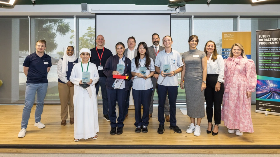 Judging panel and staff with winning DEC Wex Team; Omran Al Shamsi, Mariam Morra, Ningge Ma and Matthias Meyer.