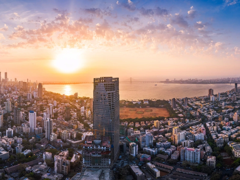 The Bandra Worli Sea Link is seen passing over the Mahim Bay, with the city around it. Dadar, Prabhadevi, Lower Parel, Worli, Matunga, Mahim and Bandra can be seen.