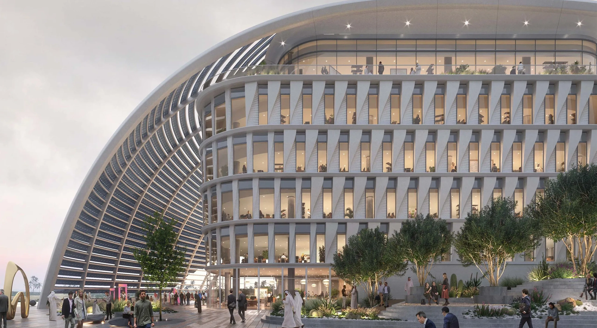 A futuristic, white multi-story office campus building.