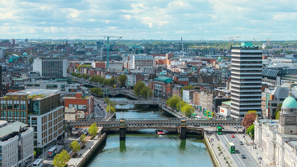 Dublin docks with the financial district connected with tech companies. View towards the land