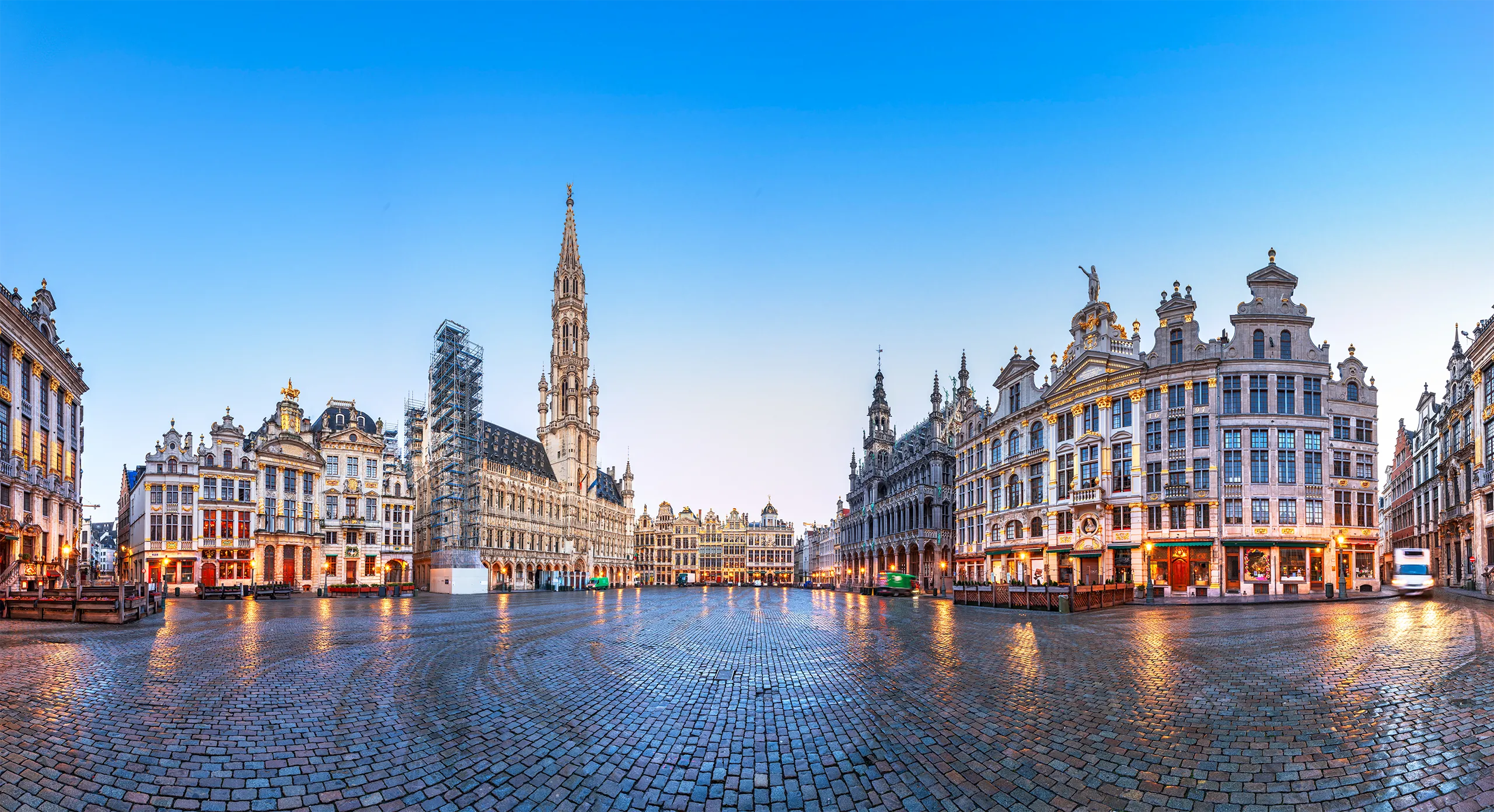 Brussels, Belgium at Grand Place with the Town Hall tower at blue hour.