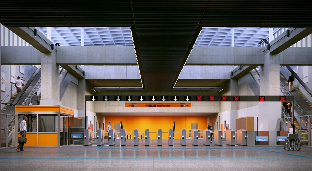 Modern metro station entrance with ticket barrier escalators and overhead signage