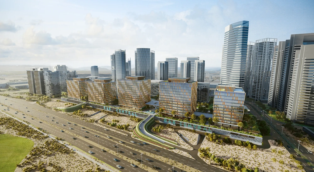 Aerial cityscape with modern skyscrapers, illuminated highways, busy traffic and dense urban development.
