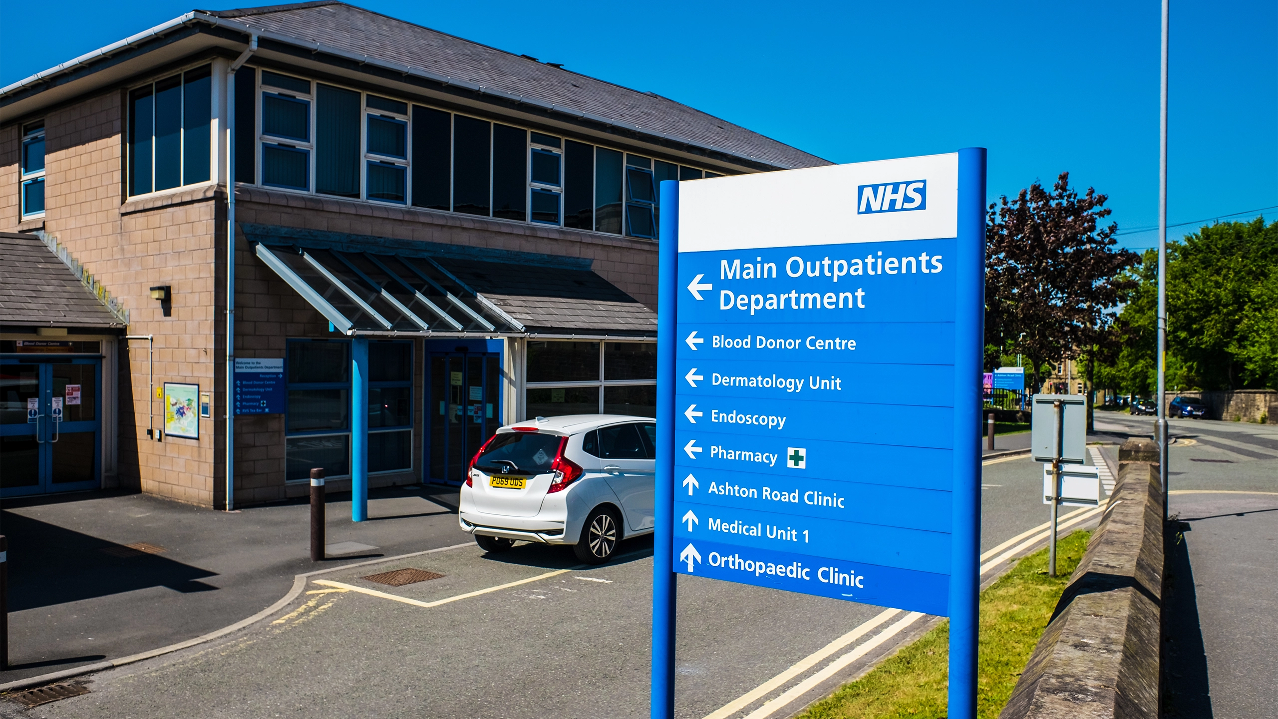 NHS outpatients building with sign outside