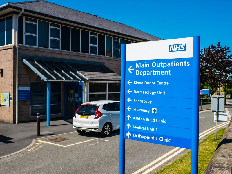 NHS outpatients building with sign outside
