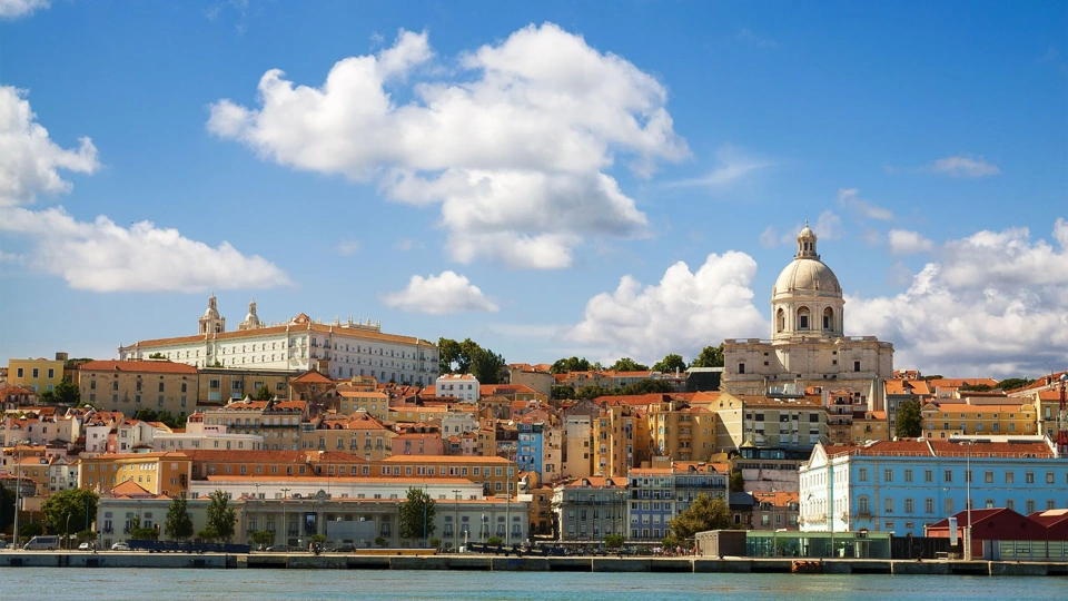 Portrait of Lisbon with modern catamaran ferry at the ferry terminal