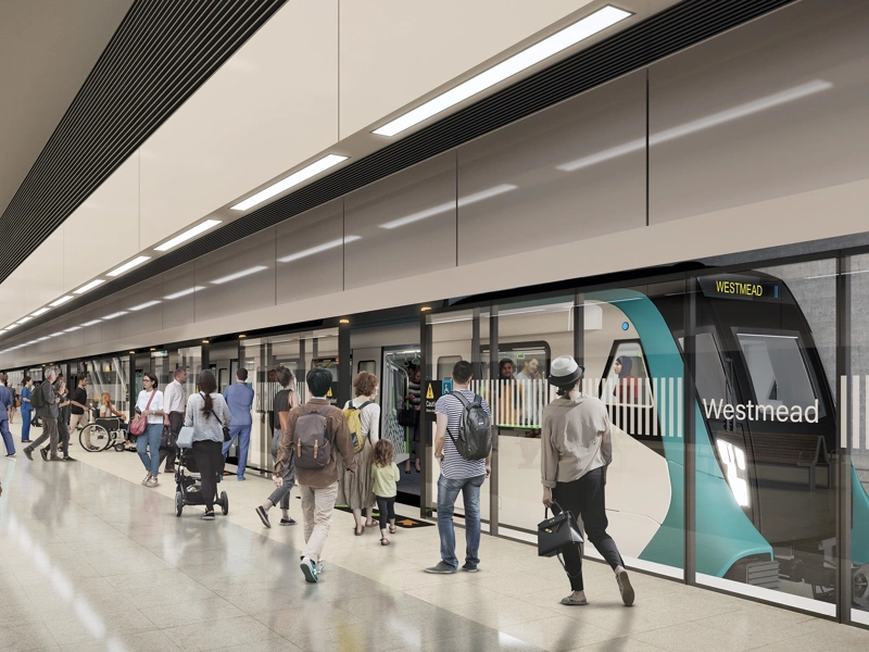 Sydney metro station train platform with passengers.