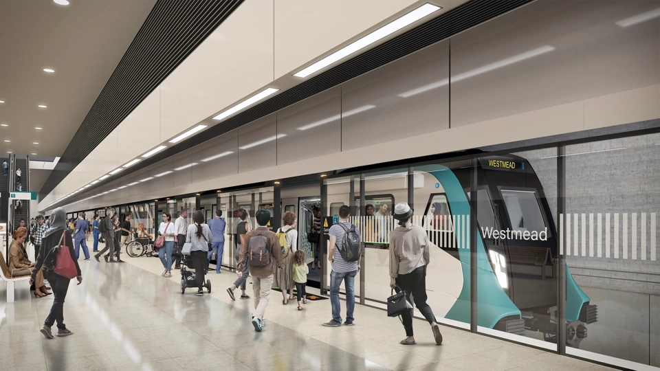 Sydney metro station train platform with passengers.