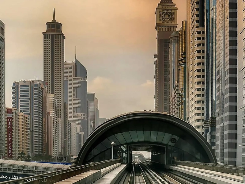 The Metro Station Showing the interior of the station. It's expansive, well-lit spaces are defined by angular, geometric structures and a minimalist aesthetic, creating a sense of order and efficiency
