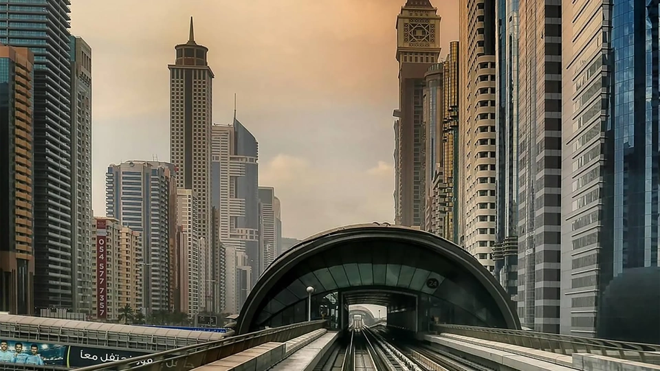 The Metro Station Showing the interior of the station. It's expansive, well-lit spaces are defined by angular, geometric structures and a minimalist aesthetic, creating a sense of order and efficiency