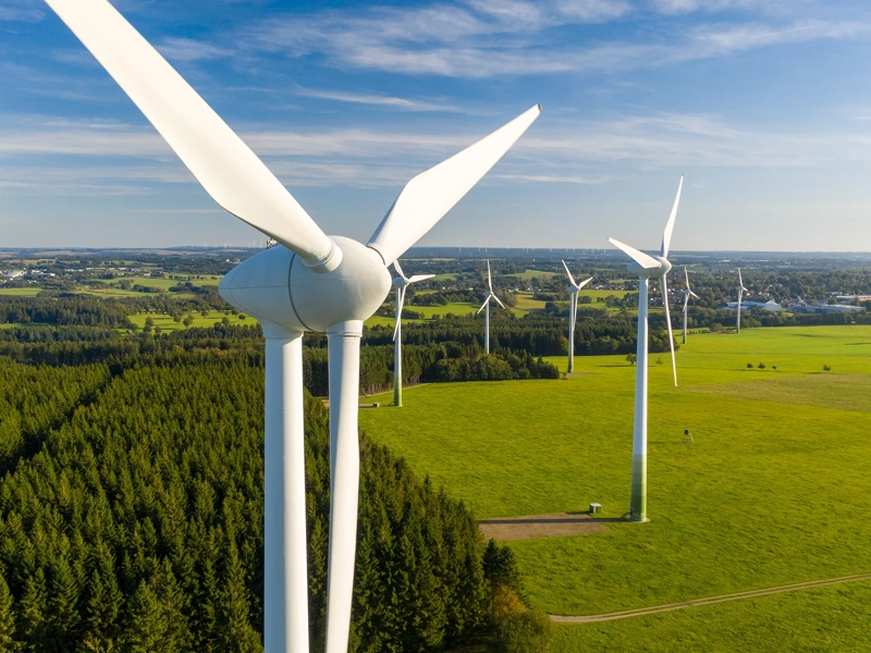 Wind turbines on a green field