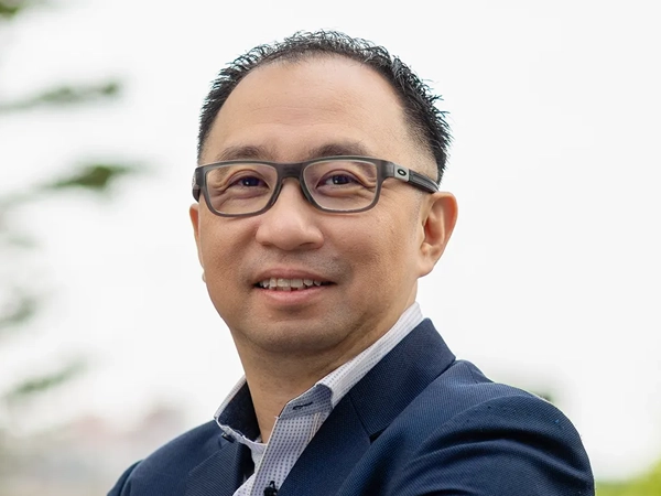 Khoo Sze Boon, Managing Director, Singapore and Vietnam, outside, smiling