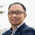 Khoo Sze Boon, Managing Director, Singapore and Vietnam, outside, smiling