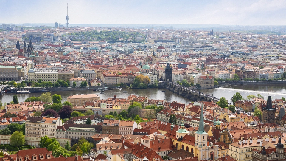 Prague cityscape with Vltava River and Charles Bridge