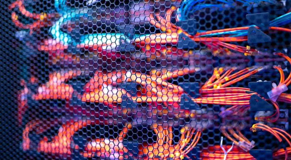 Red and orange cables in server room.