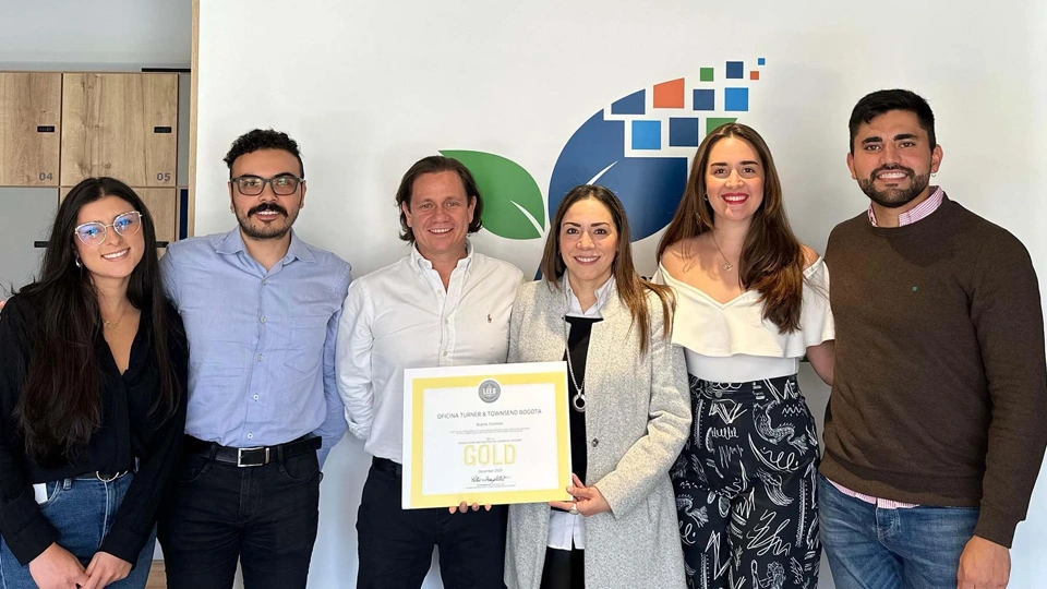Group of people holding certificate