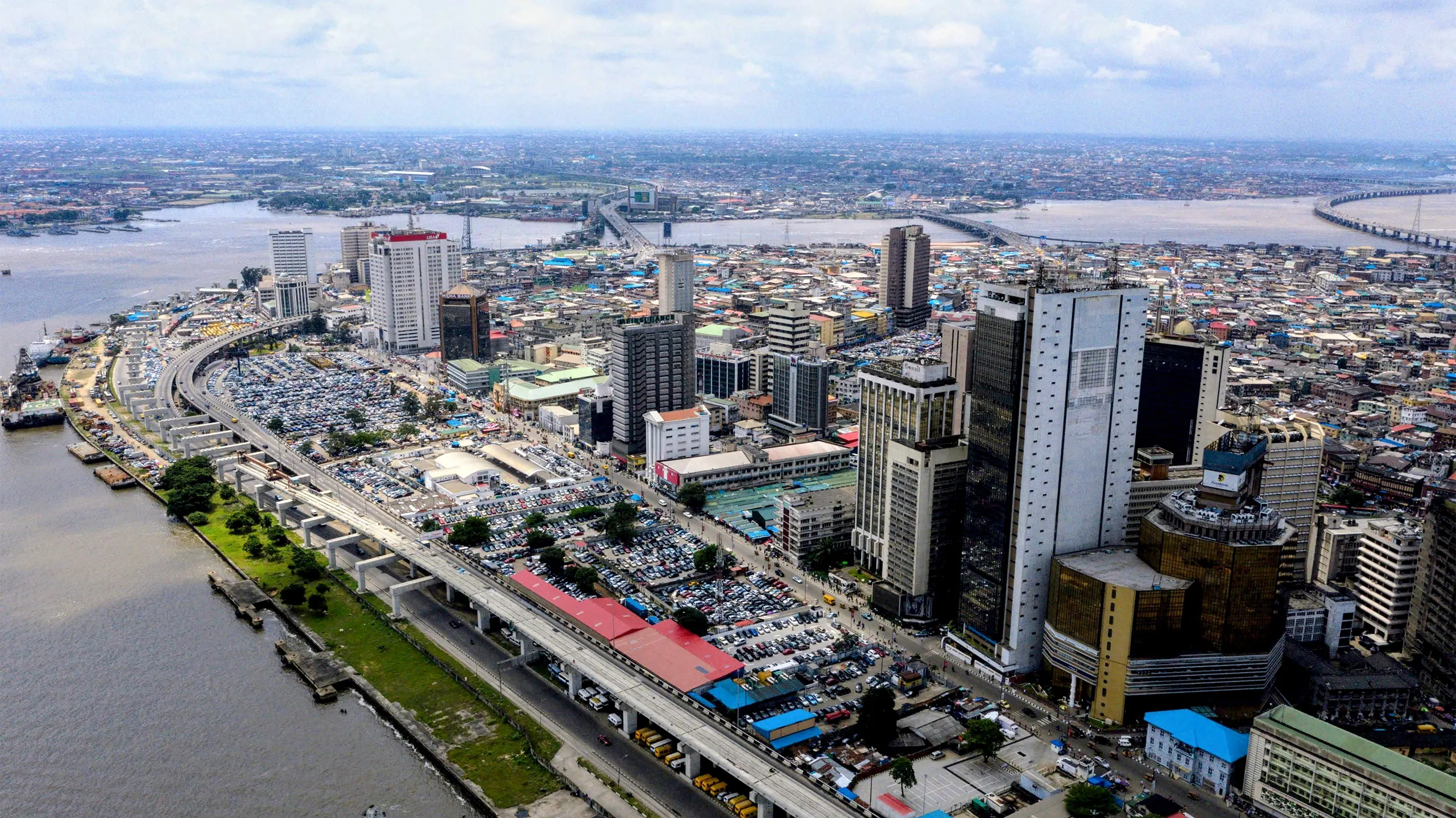 Drone shot of Lagos Marina with the three bridges in the background