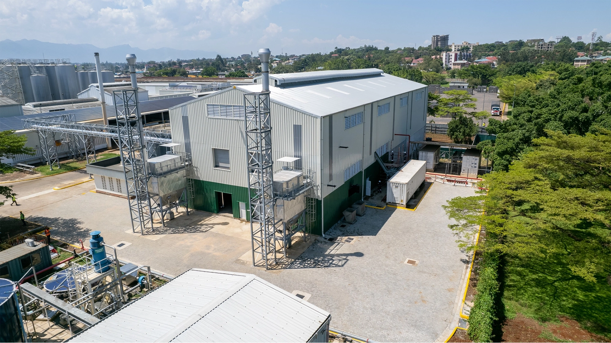 Aerial shot of East African Breweries biomass steam plants, Africa