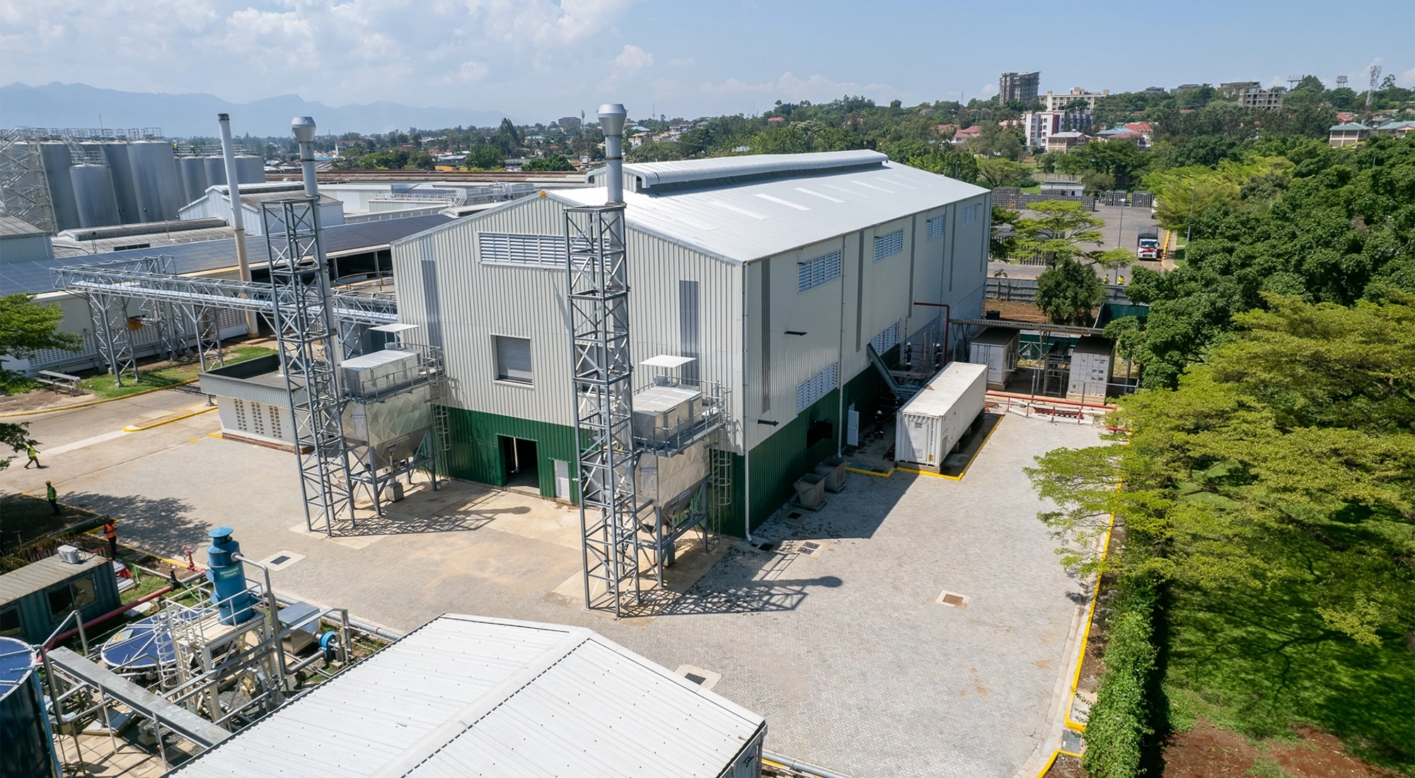 Aerial shot of East African Breweries biomass steam plants, Africa