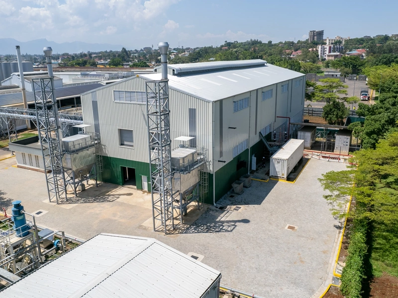 Aerial shot of East African Breweries biomass steam plants, Africa