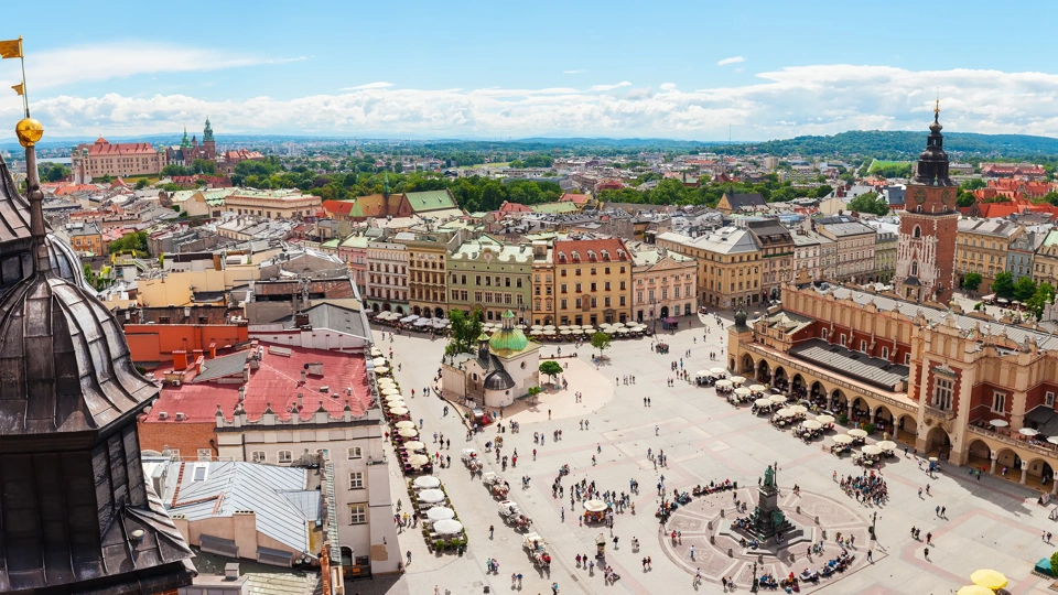 Aerial view on the central square and Sukiennice in Krakow. Market Square from the tower of the church of St. Mary. Poland. Cloth Hall.