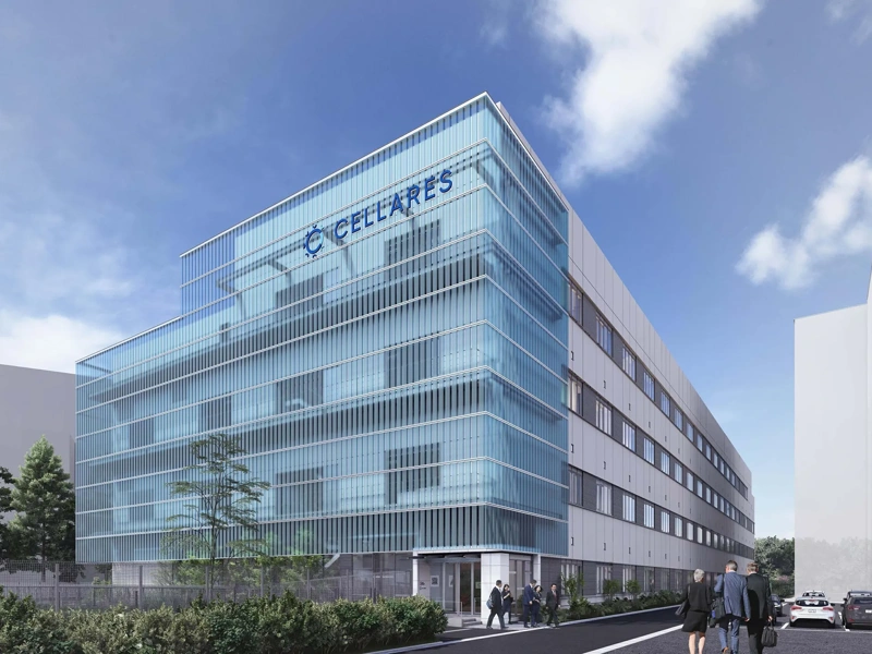 Image of Cellares’ first Asian cell therapy facility which is a blue window based building with blue skies and trees.