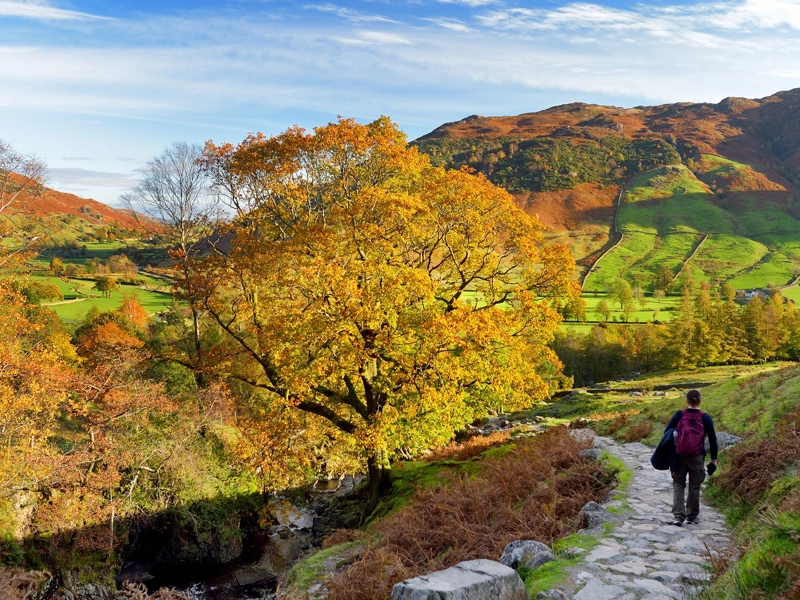 Male hiker exploring the Great Langdale Valley in the Lake District