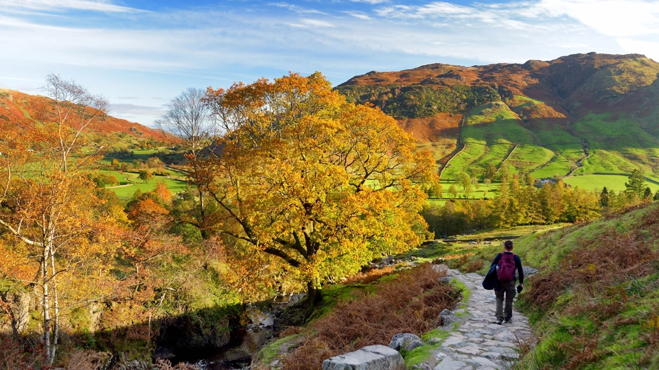 Male hiker exploring the Great Langdale Valley in the Lake District