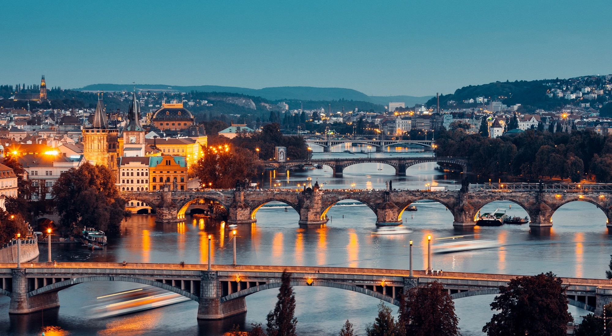 Prague cityscape with Vltava River and Charles Bridge