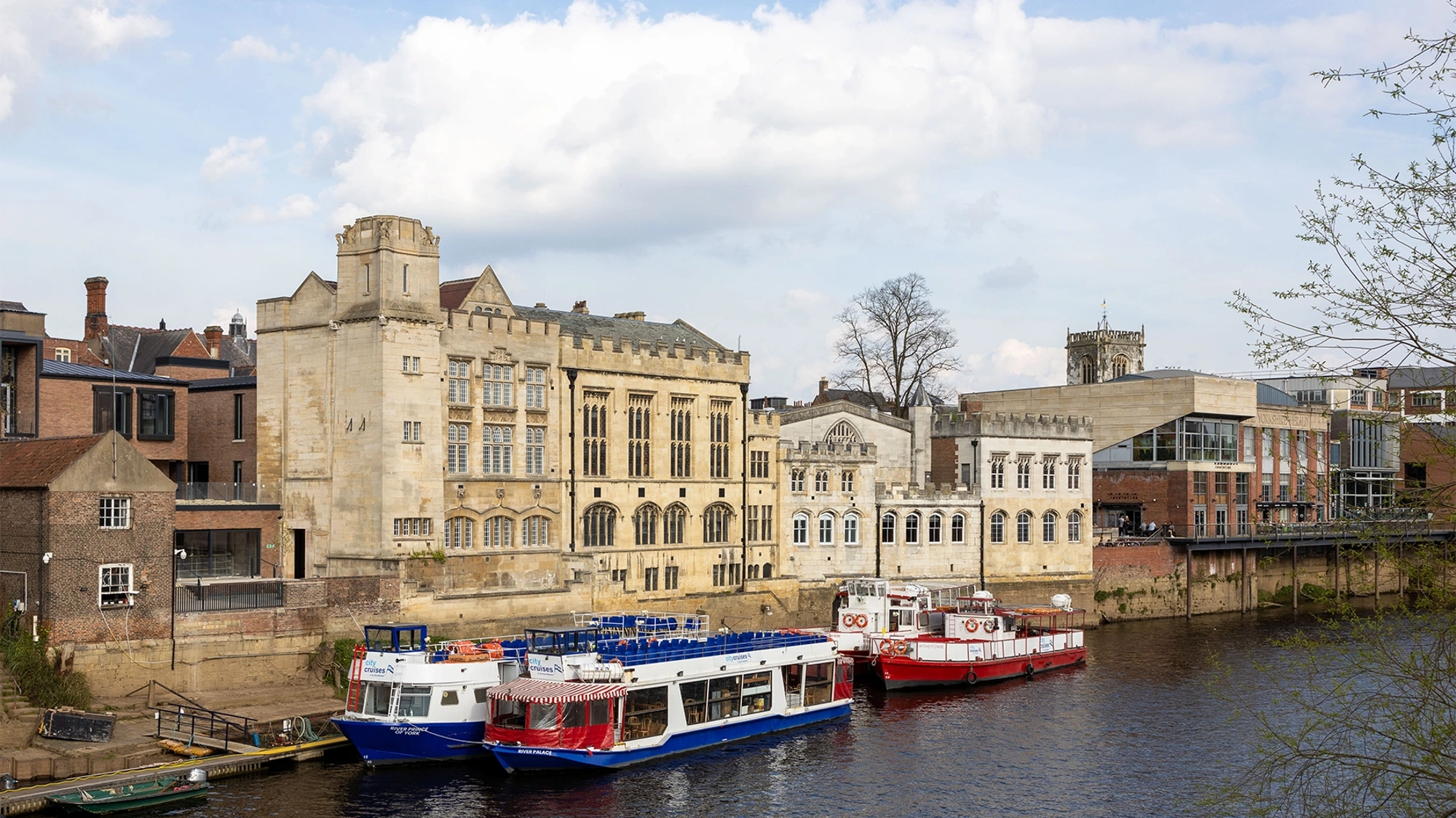 External shot of The Guildhall and the adjacent River Ouse in the UK
