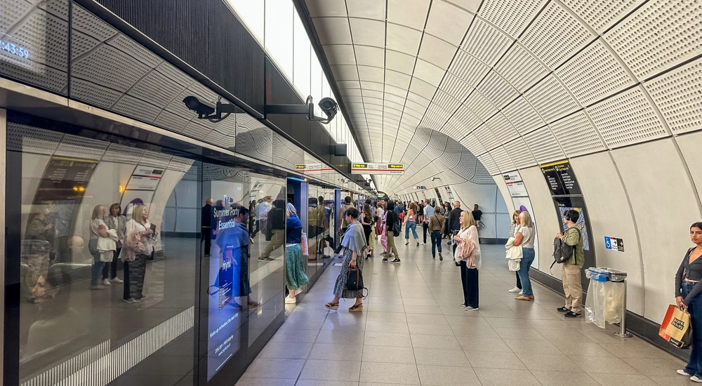 Commuters using platform at Tottenham Court Road Station of the Elizabeth Line, London, UK