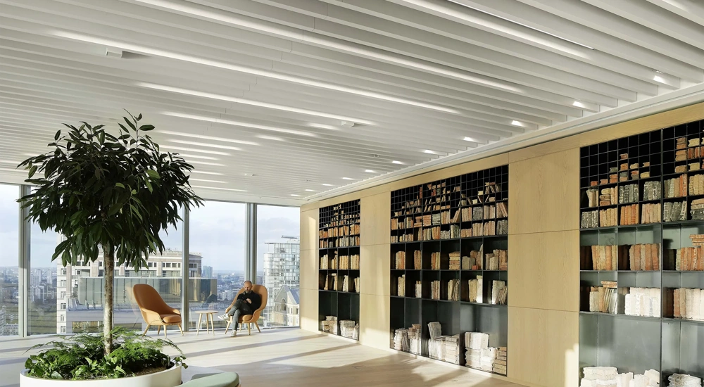 Interior of Five Bank Street with skyline view and central plant installation, London, UK