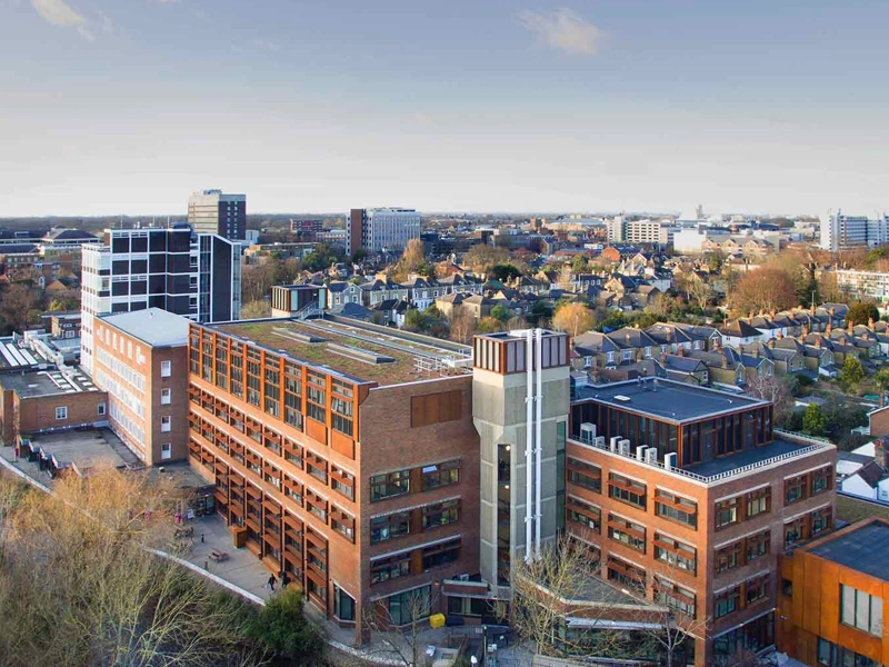 Birdseye view of brown and white buildings and houses