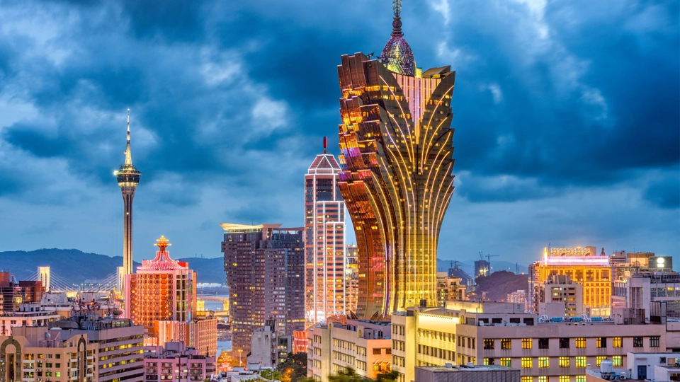 Macau at night with buildings and skylines lit up