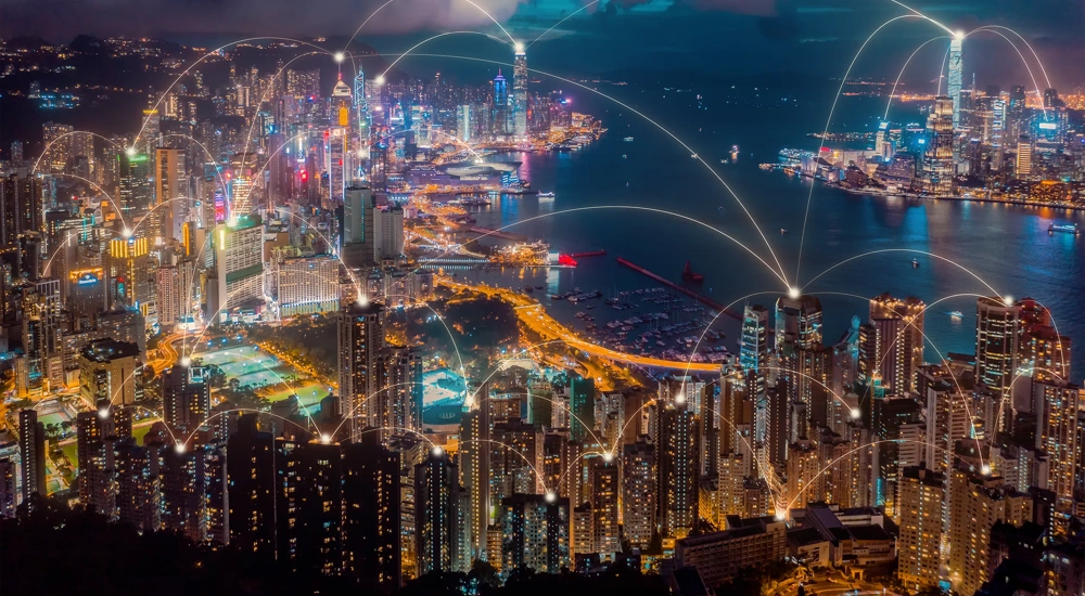 Aerial view of Hong Kong city with connection network technology. Wireless network global communication internet of thing smart city concept big data