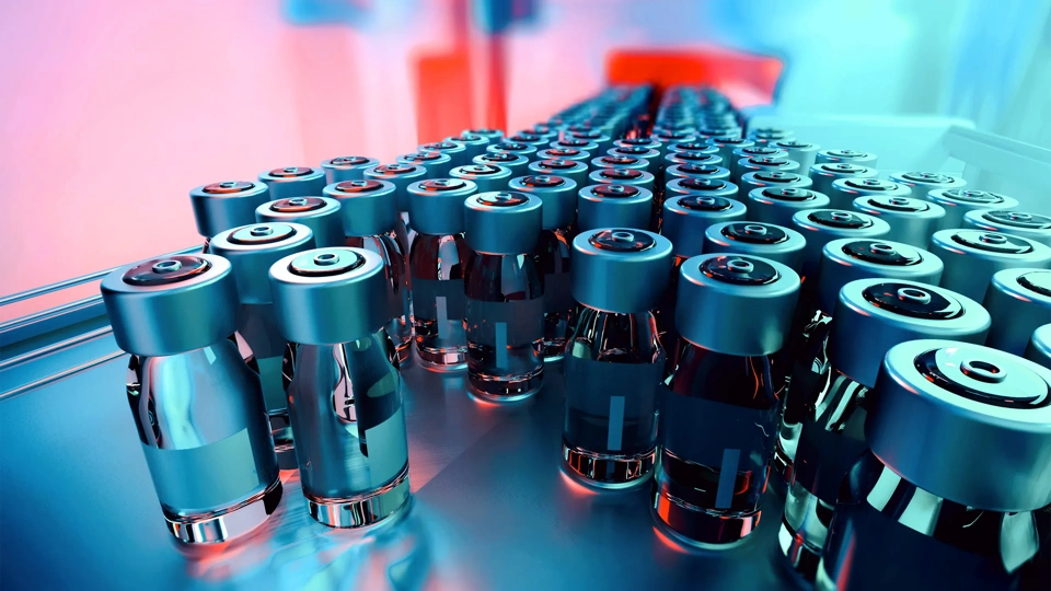Large group of glass vials in a lab on a metal tray