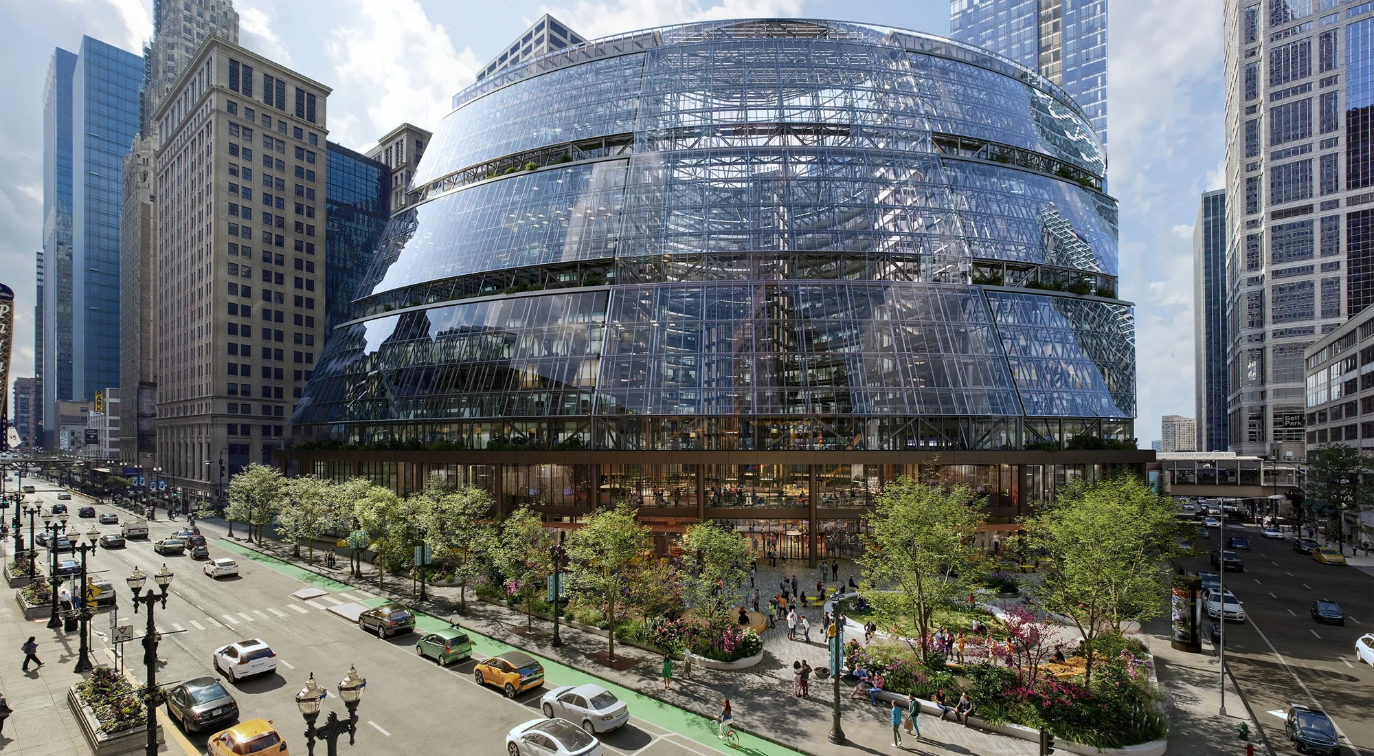 The Google Thompson Center in Chicago, a 17-storey, glass fronted building set to a backdrop of cars and greenery.