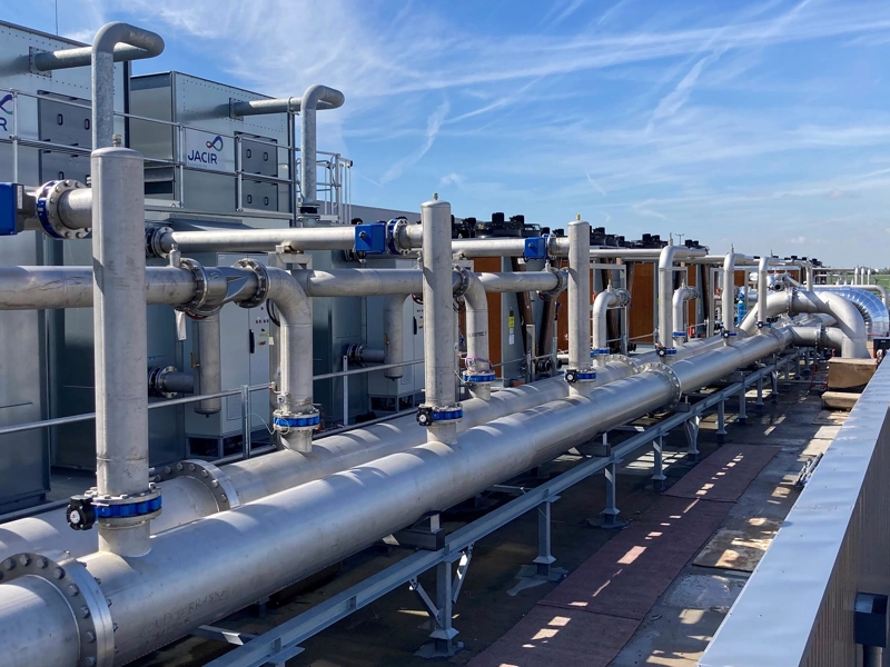 Sunny exterior shot of the AESC Douai battery gigafactory in France.